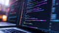 Programming code displaying on laptop screen for software development Royalty Free Stock Photo