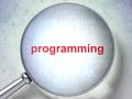 Programming concept: Programming with optical glass Royalty Free Stock Photo