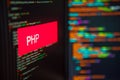 Programming language, PHP inscription on the background of computer code. Royalty Free Stock Photo