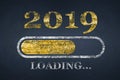 Progress bar showing loading of 2019. New Year loading. Chalk Drawing. New year 2019 loading on Blackboard Royalty Free Stock Photo