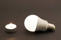 Progress of lighting with candle and LED bulb. Royalty Free Stock Photo