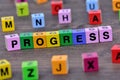 Progress word on table