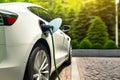 A progressive concept for car and home charging station for electric vehicles powered by sustainable and clean energy with zero Royalty Free Stock Photo