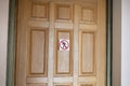 a prohibited to pass, no go zone area symbol sticker on the door