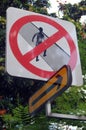 Prohibiting pedestrian road sign with arrow symbol