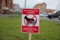 Prohibiting sign you can not walk with a dog on green lawn Royalty Free Stock Photo