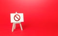 Prohibition sign NO easel on red background. No access, restricted area. Absence of something. Sanction restrictions. Ban, Embargo