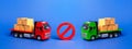 Prohibition sign NO between two trucks. Embargo trade wars. Restriction on importation, ban transit export dual-use goods Royalty Free Stock Photo