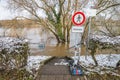 Prohibition signs at the flood of the river Danube in winter 2021 in Regensburg with the notice - flood - in German language