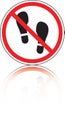 Prohibitive sign with an imprint from boot