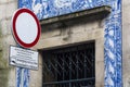 Prohibitory traffic sign with blue building in the background. Traditional portuguese tiles. Porto Royalty Free Stock Photo
