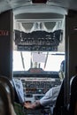 Proitrat view of Cockpit of Beechcraft 1900D in flight from passanger seat