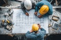 Project Coordination: Engineers and Architects Working on Plans Royalty Free Stock Photo