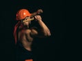 The project is currently under construction. Man work with hammer. Construction worker hammer a nail. Muscular man Royalty Free Stock Photo