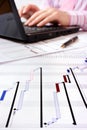 Project Gantt chart with laptop in background Royalty Free Stock Photo