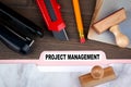 Project management concept. Folder Register on a dark wooden desk Royalty Free Stock Photo