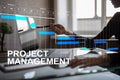 Project management concept, time and human resources, risks and quality and communication with icons on virtual screen. Royalty Free Stock Photo