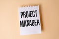 Project Manager text on white sticky note on yellow background Royalty Free Stock Photo
