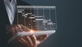 Project manager working with Gantt chart schedule to plan tasks and deliverables.