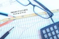 Project S-Curve With Eyeglasses, pencil, pen and calculator. Royalty Free Stock Photo