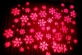 The projected pink icicle on the red curtain of a stage Royalty Free Stock Photo