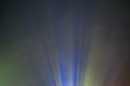 Projector colored light beam through smoke for movie and cinema at night