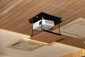 Projector hanging on meeting room ceiling Royalty Free Stock Photo