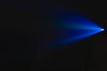 Projector spotlight blue color , smoke texture background . light beam screening and glowing for movie cinema and film multimedia Royalty Free Stock Photo