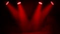 Projector spotlight on the floor . Beautiful red performance stage. Isolated on black background texture