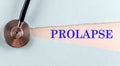 PROLAPSE word made on torn paper, medical concept background