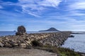 Prolongation of land in the sea. Royalty Free Stock Photo