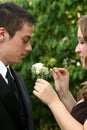 Prom Couple Preparing Boutonniere