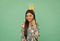 Prom Party. Happy Girl Hold Paper Crown. Prom Queen Blue Background. Contest Winner. Enjoying Photobooth Fun