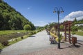 Promenade along a river Szczawnica village on sunny summer day,