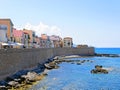 Promenade along the sea and walls in Alghero. Sardinia, Italy.