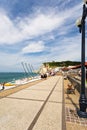 Promenade and arch cliff in Etretat, France