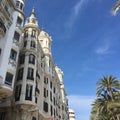 Promenade architecture under bright blue sky