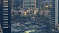 Promenade and canal in Dubai Marina with luxury skyscrapers and yachts around timelapse, United Arab Emirates Royalty Free Stock Photo