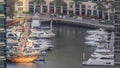 Promenade and canal in Dubai Marina with luxury skyscrapers and yachts around , United Arab Emirates Royalty Free Stock Photo