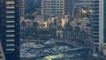 Promenade and canal in Dubai Marina with luxury skyscrapers and yachts around , United Arab Emirates Royalty Free Stock Photo