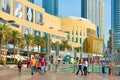 Promenade near the Dubai Mall with walking tourists