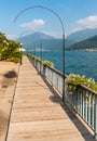 Promenade of picturesque village Morcote on the shore of lake Lugano, Ticino, Switzerland Royalty Free Stock Photo