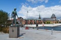 promenade at port of aarhus with sculpture seaman Royalty Free Stock Photo