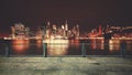 Promenade with view of Manhattan skyline at night, New York. Royalty Free Stock Photo