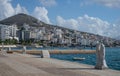 Promenade walkway by the beach with date palms, restaurants and hotels in Saranda Albania Royalty Free Stock Photo