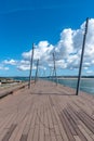 Promenade with wooden decking and street lamps