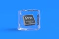 Promethium Pm chemical element of periodic table in ice cube. Symbol of chemistry element Royalty Free Stock Photo