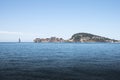 Promontory of Gaeta with sailing boat seen from the sea