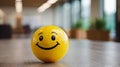 Promoting Workplace Positivity: Yellow Smiley Ball Brings Smiles to Office Interiors.