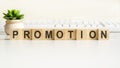 Promotion word made with wooden blocks, concept